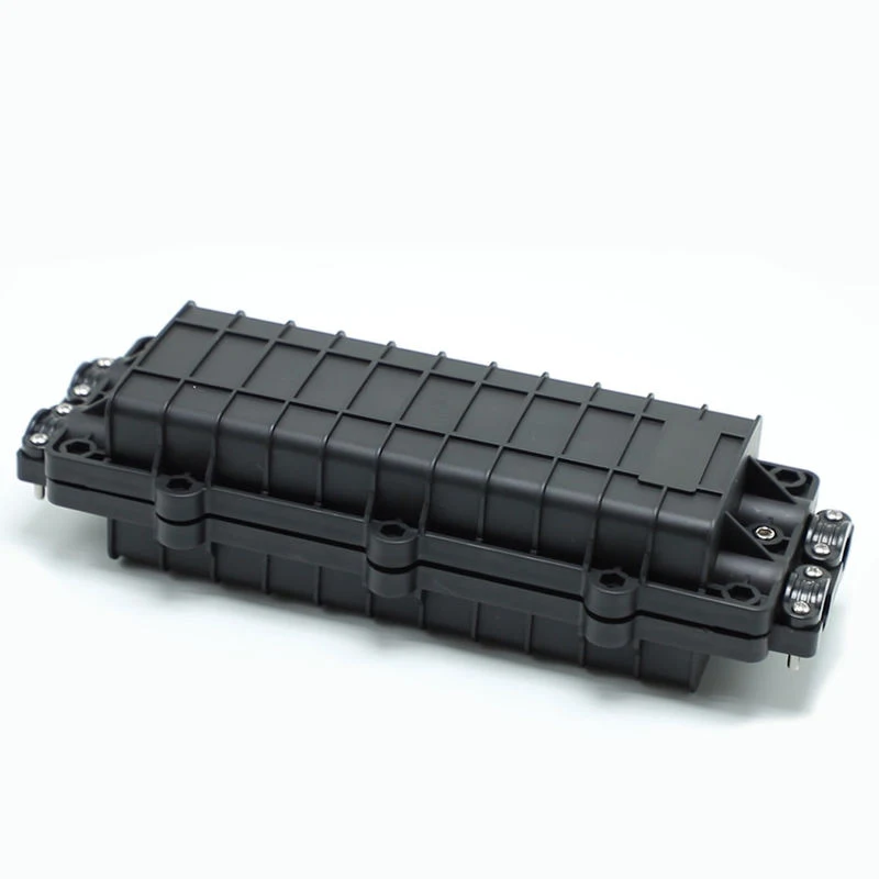 Inline splice closure open showing splice trays and cable ports
